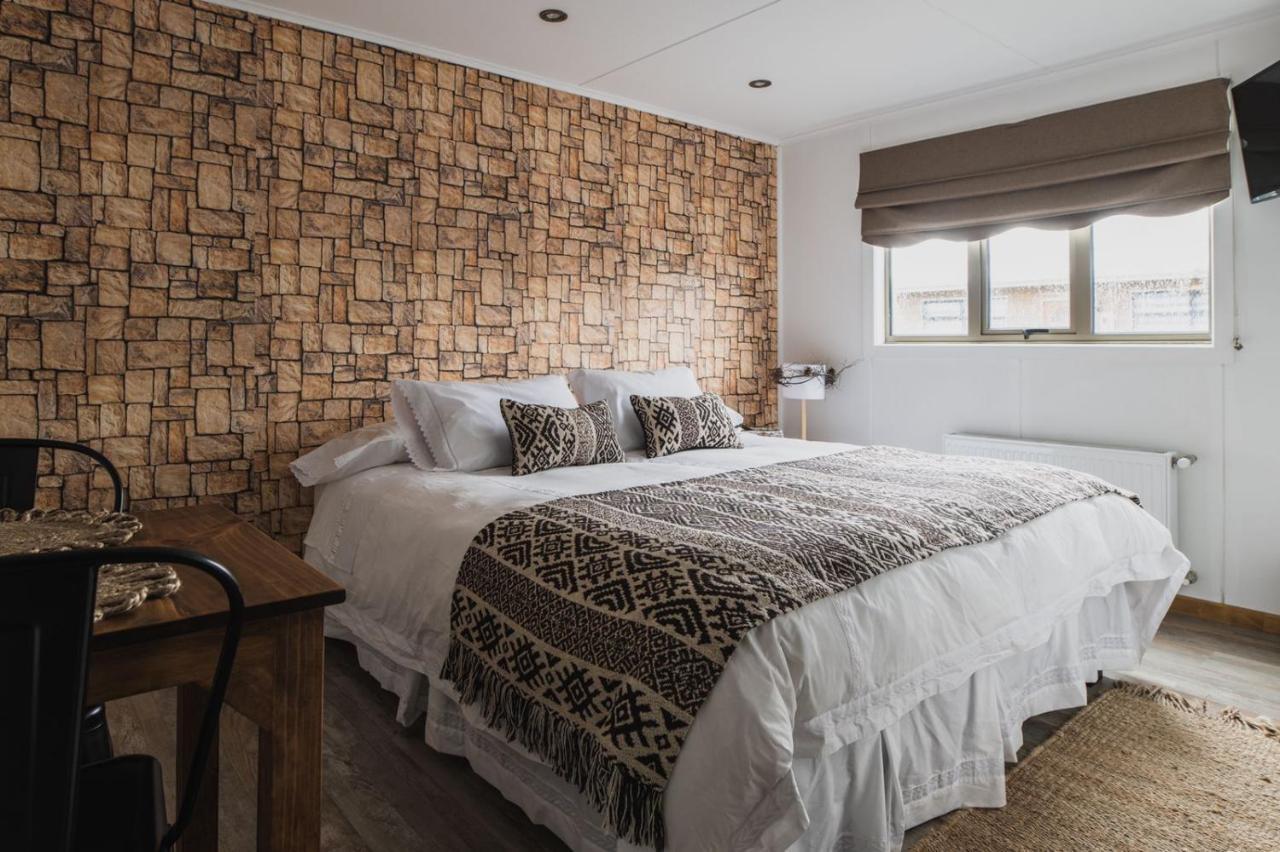 Hostal Lago Condor Пуерто Наталес Екстериор снимка