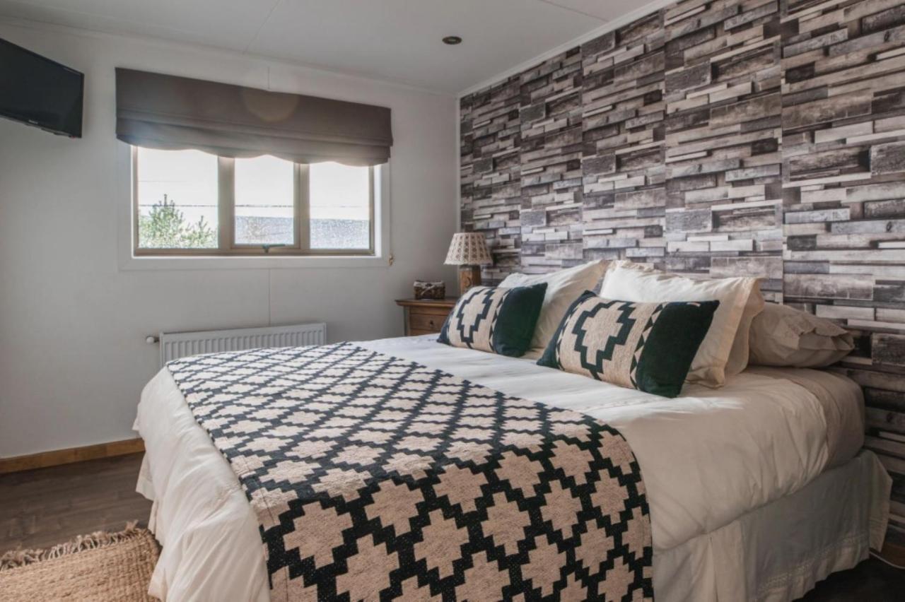 Hostal Lago Condor Пуерто Наталес Екстериор снимка