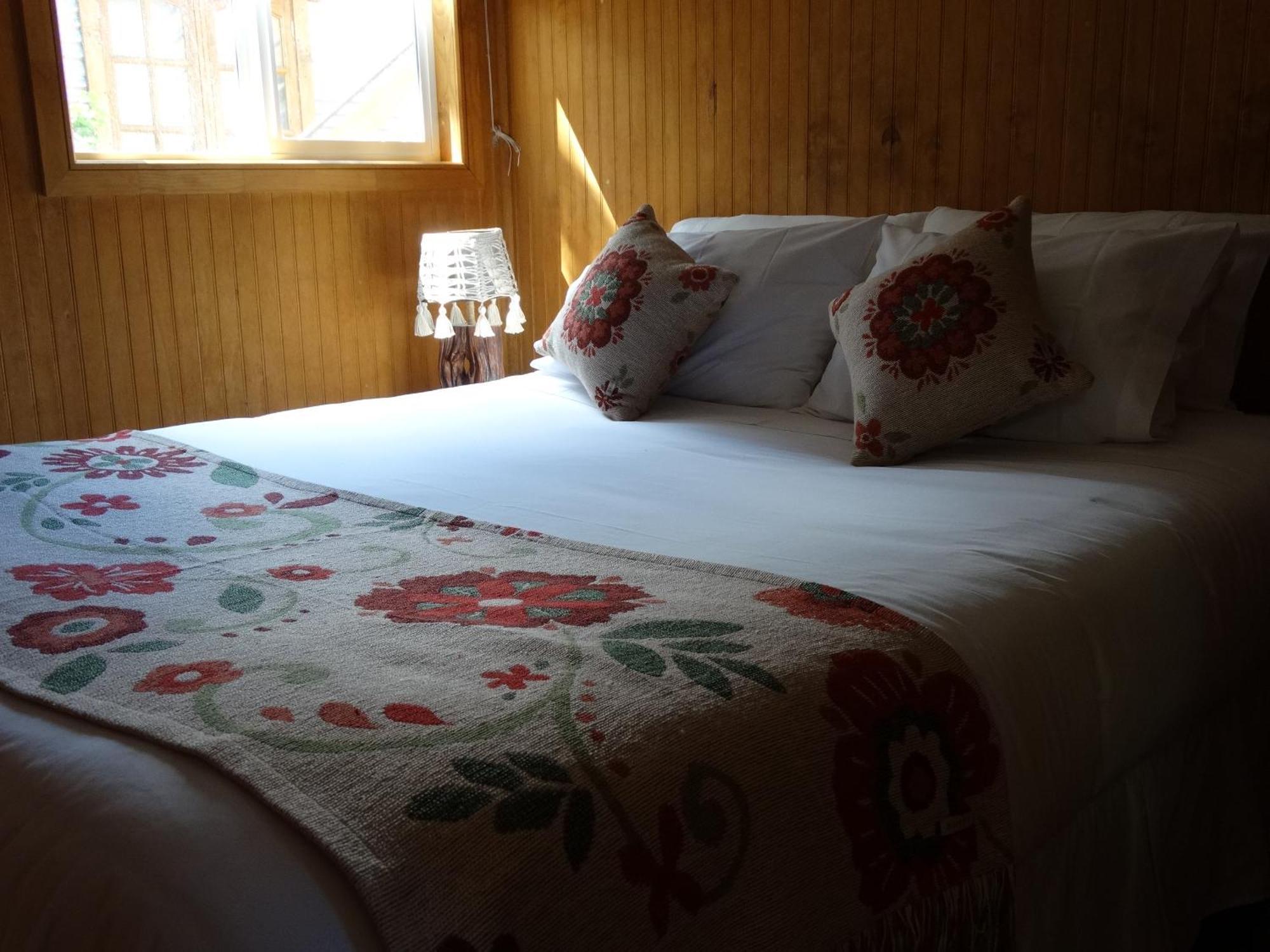 Hostal Lago Condor Пуерто Наталес Екстериор снимка