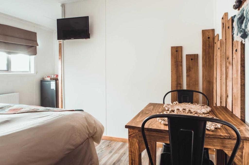 Hostal Lago Condor Пуерто Наталес Екстериор снимка